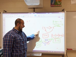 Mr. Ruzbarsky teaches a lesson in the Support Center. (Photo by Valeria Araujo)